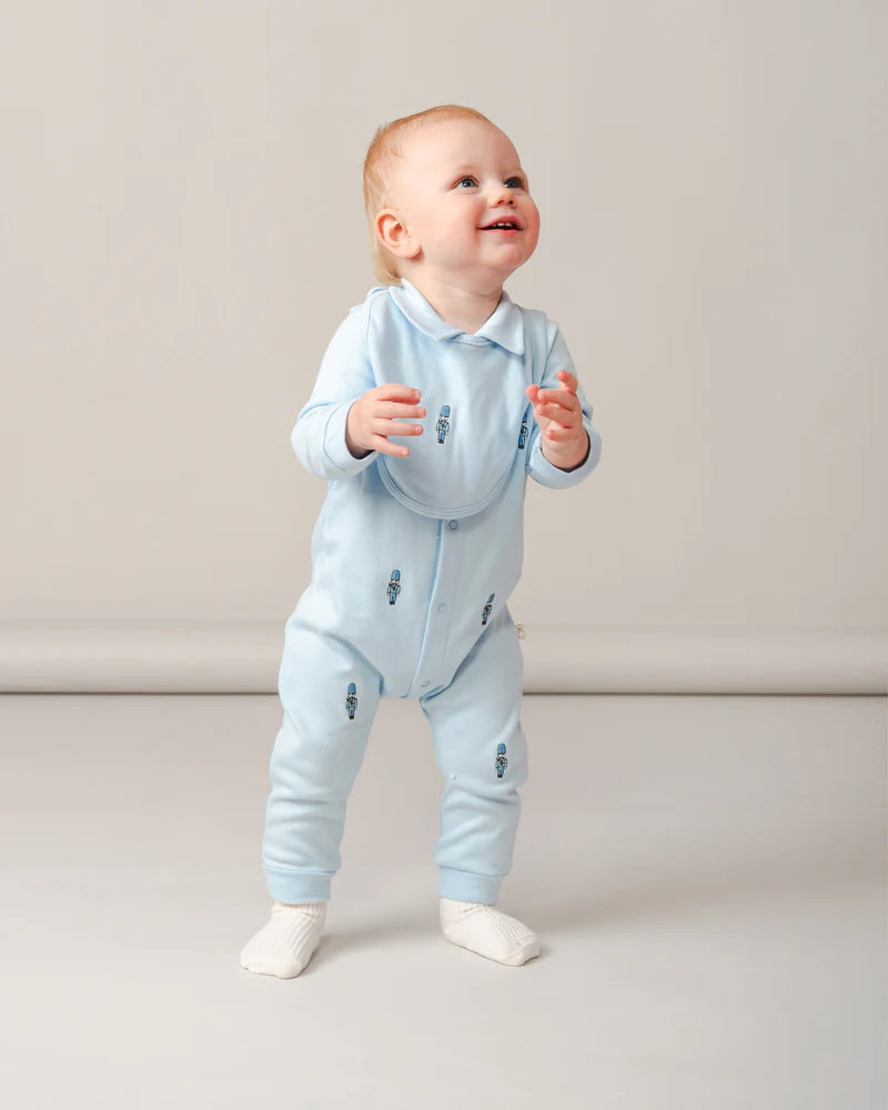 Caramelo Kids - Blue all in one and bib, soldier design