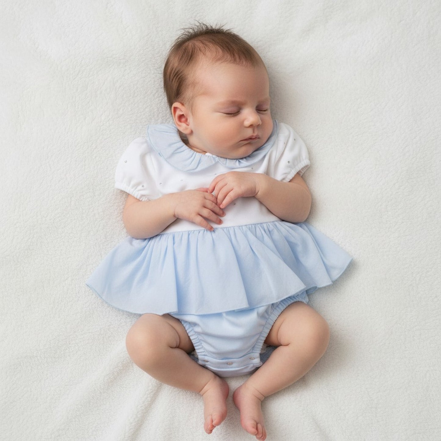 Mintini - Light blue and white romper with mock dress overlay