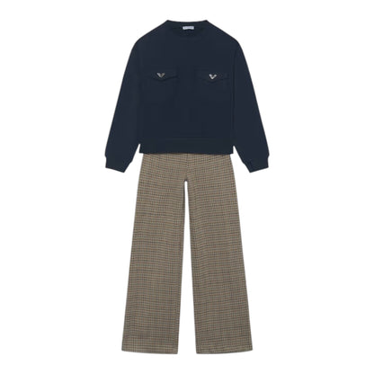 A two-piece clothing set featuring a dark navy blue long-sleeve crewneck sweatshirt with two chest pockets, and wide-leg trousers in a brown and beige houndstooth pattern, displayed on a solid white background.