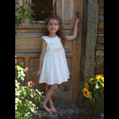 Deolinda - Ivory dress with smocking detail